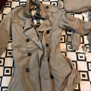 Burberry trench coat. Unused and authentic